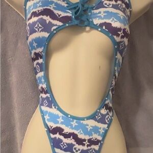 Exotic dancewear Blue and White Patterned tie dye like material is spandex